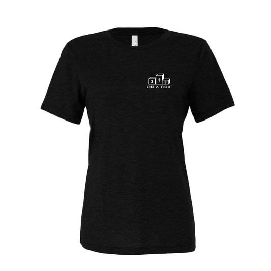 Black women’s On A Box Another Family Vacation tee with small chest logo